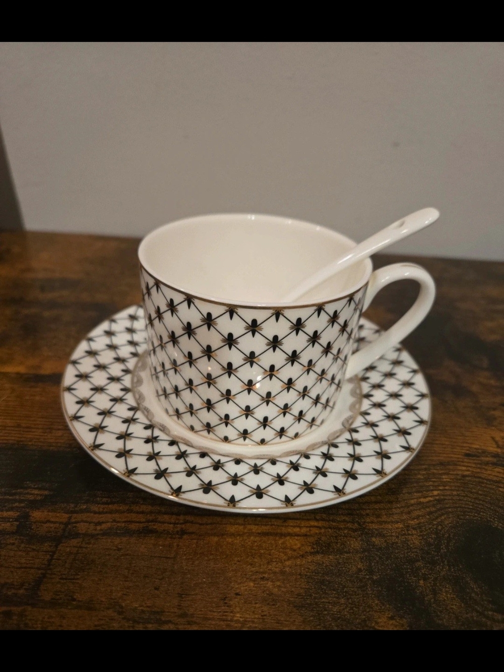 Elegant White Porcelain Coffee Cup & Saucer Set with Black Lattice Pattern